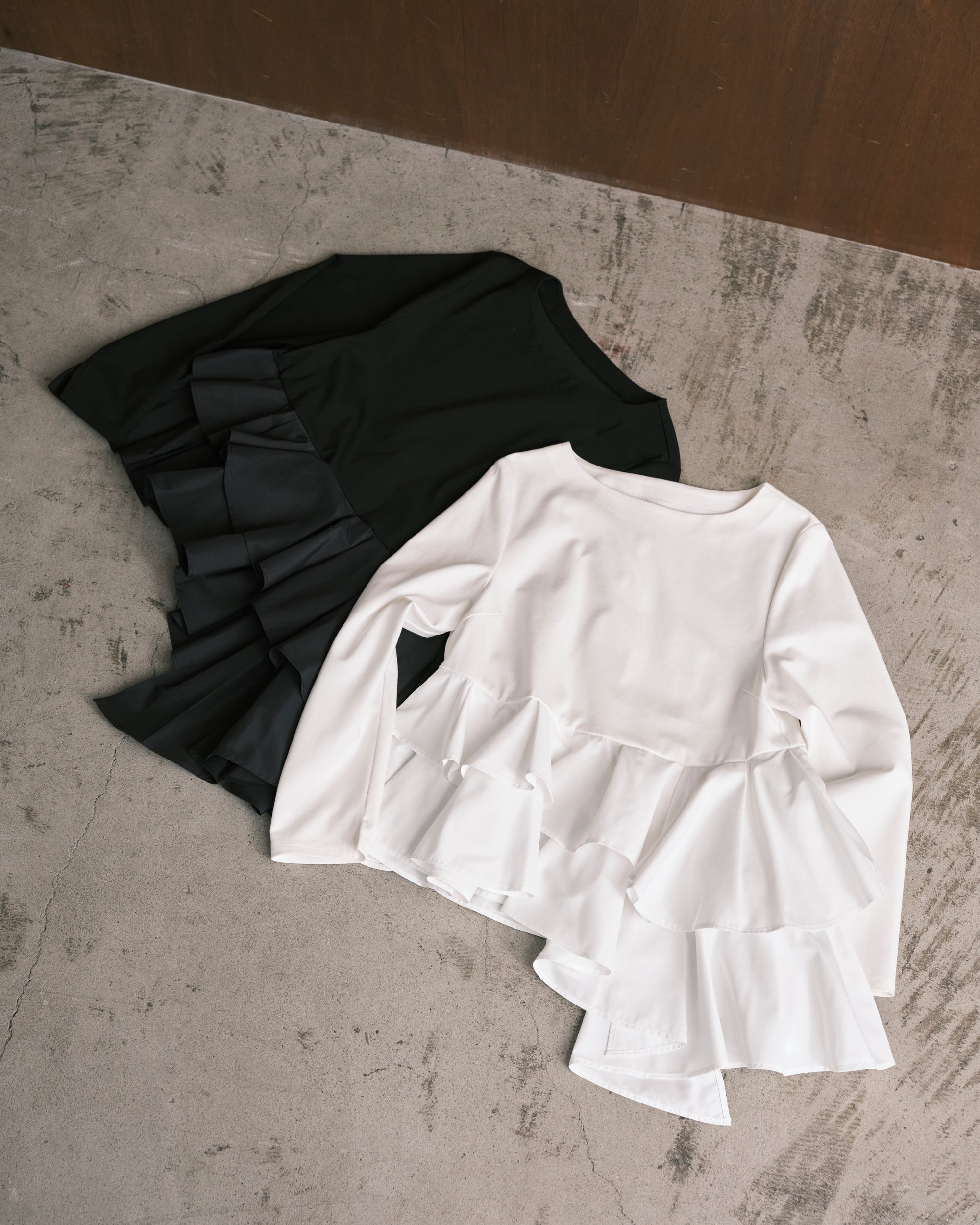 Asymmetry Hem Tops – em.